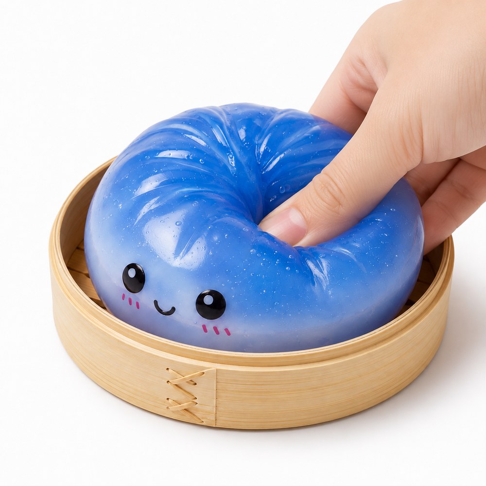 Hand pressing a Bun Mystery squishy — soft slow-rebound texture